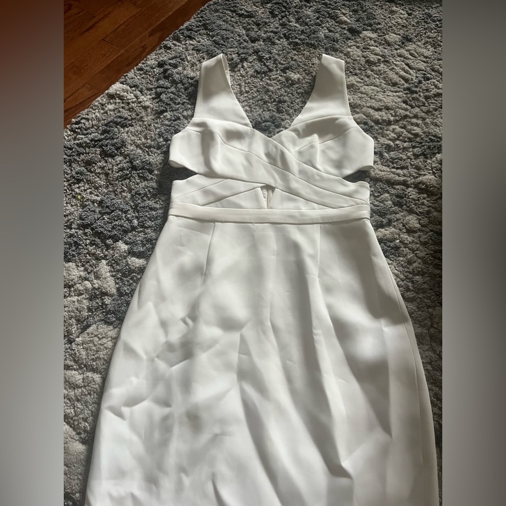 White BCBGMAXAZRIA mini dress with cut outs